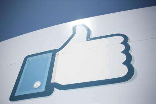 A Facebook Like Button logo at the entrance of the headquarters in Menlo Park on May 10, 2012
