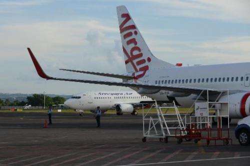 A file photo shows a Virgin Australia aircraft on the tarmac at Denpasar airport on the resort island of Bali, in April, 2014