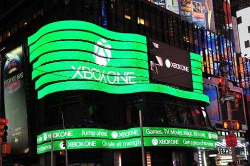 A giant video screen shows the logo for Microsoft's Xbox One game console on November 21, 2013 in New York's Times Square