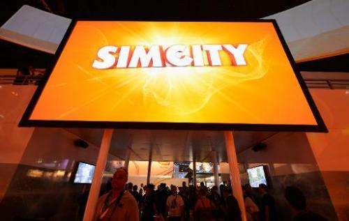 A large screen shows the video game &quot;Simcity&quot; at the E3 gaming conference on June 5, 2012 in Los Angeles, California