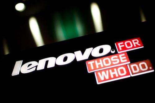 A Lenovo logo on display in Hong Kong on February 13, 2014. Shares in the Chinese technology giant drop 5% after it posts weaker