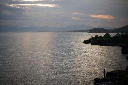 A man fishes on the edge of Lake Kivu on May 28, 2012 near the city of Goma in North Kivu province in the Democratic Republic of
