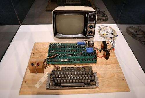 An Apple-1 computer, built in 1976, is displayed during an online auction featuring vintage tech products on June 24, 2013, in M
