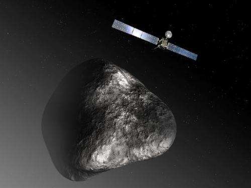 An artist impression released by the European Space Agency on December 3, 2012 of the Rosetta orbiter and the 67P/ChuryumovGera