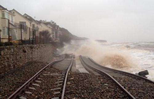 A Network Rail picture shows waves whipped up by stormy weather crashing over train lines in Dawlish in south Devon, southern En