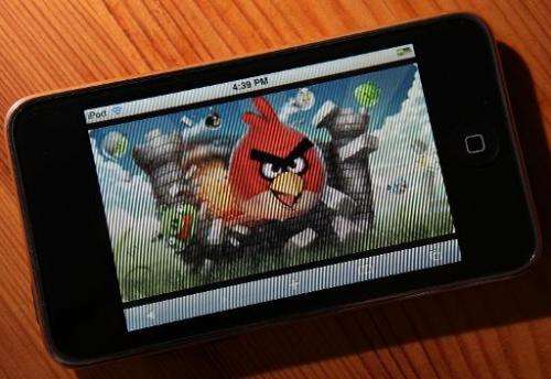 An image of the popular video game &quot;Angry Birds&quot; is displayed on an iPod Touch