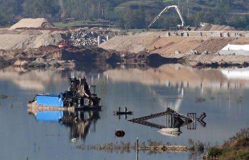 A partially-submerged factory is pictured near Jianying village in China's central Henan province on November 3, 2014