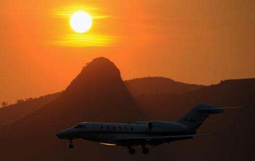 A plane land in Rio de Janeiro, FIFA estimates the World Cup will produce 2.7 million tonnes of C02 emissions