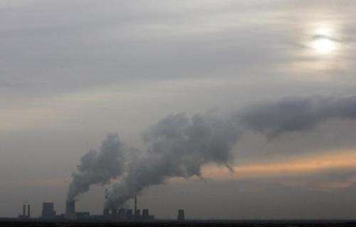 A power plant spews smoke into the evening sky on November 20, 2007 in Boxberg, Germany, contributing to fast-rising greenhouse 