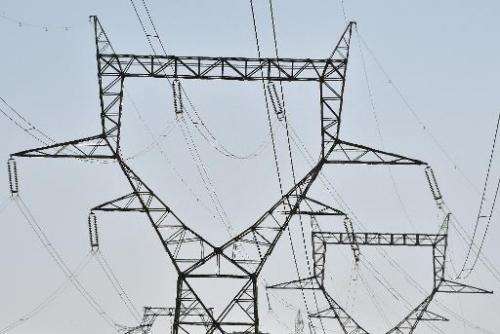 A pylon supports a high voltage line near La Redorte southern France on June 20, 2014