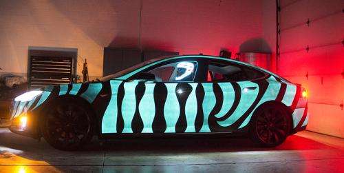 A spray-on light show on four wheels: Darkside Scientific
