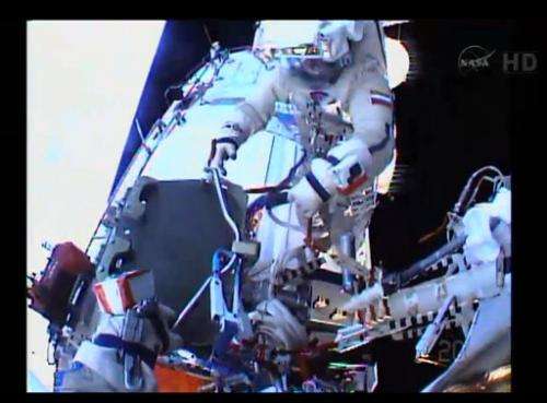 Astronauts repeat spacewalk, with mixed success