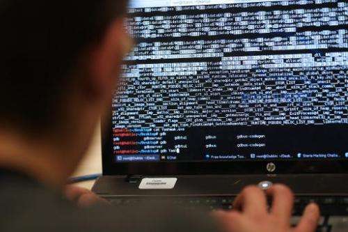 A student from an engineering school attends the first edition of the Steria Hacking Challenge, in France, on March 16, 2013