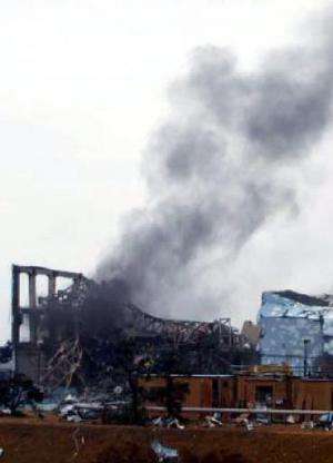 A TEPCO picture released on March 21, 2011 shows black smoke rising from reactor number three at the crippled Fukushima nuclear 
