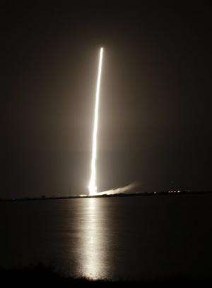 Atlas V rocket launches, taking satellite aloft