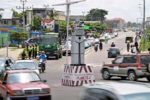 A traffic robot cop is seen on Triomphal boulevard in Kinshasa, at the crossing of Asosa, Huileries and Patrice Lubumba streets,