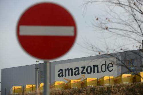 A traffic sign forbidding trespassing stands in front of the logistics center of internet retail giant Amazon in Bad Hersfeld, c