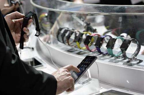 A visitor tests the Sony SmartWatch 2 during the 2014 Mobile World Congress in Barcelona on February 25, 2014