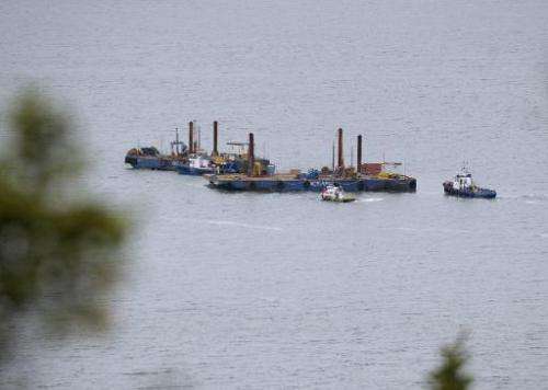 Barges conduct seismic tests in the St. Lawrence river in Cacouna, Quebec on September 23, 2014, in order to build an oil termin