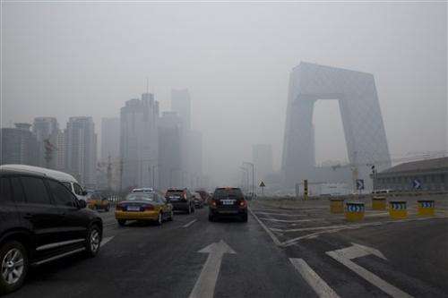 Beijing issues rare air pollution alert