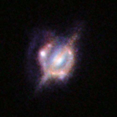Best view yet of merging galaxies in distant universe