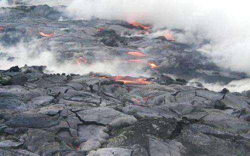 Breakouts of lava from Hawaii's Kilauea volcano are seen near the West end of Wilipe, Hawaii, on July 31, 2002