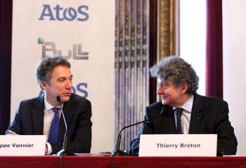 CEO of the IT services company Atos Thierry Breton (R) and Philippe Vannier, new CEO of French group Bull, hold a press conferen