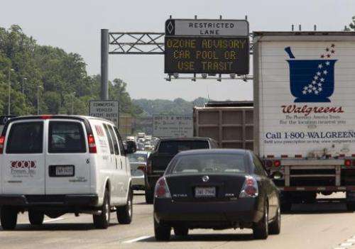 Commuters drive on Interstate 66 in Fairfax, Virginia, during an ozone alert, on May 31, 2007