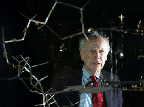 Dr. James Watson is seen with the original DNA model ahead of a press conference at the Science museum in London on May 20, 2005
