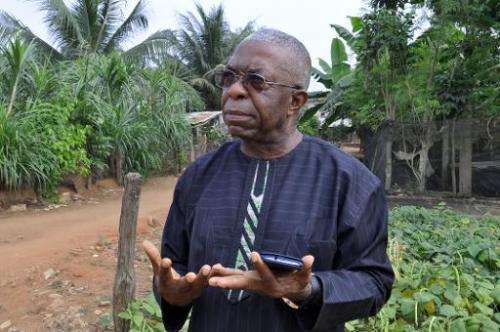 Father Godfrey Nzamujo, director of the Centre Songhai, speaks on the farm in Porto Novo, Benin, on January 30, 2014