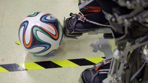 Feet of the Iron Man-like suit a paraplegic will wear to kick first ball of the World Cup, created by Brazilian scientist Miguel