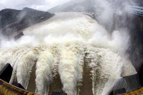 File picture of water being discharged from a reservoir at the Shuikou Dam in southeastern China's Fujian province on May 24, 20