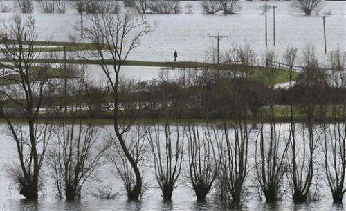 Flooded British villages ignite climate debate
