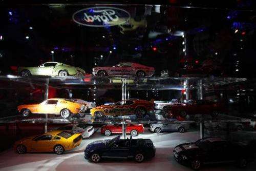 Ford cars on display at the 50 Years of Mustang celebration ceremony in Beijing on April 19, 2014