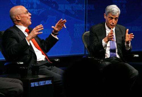 Former US Treasury Secretaries Henry Paulson (L) and Robert Rubin participate in a panel discussion on November 17, 2008 in Wash