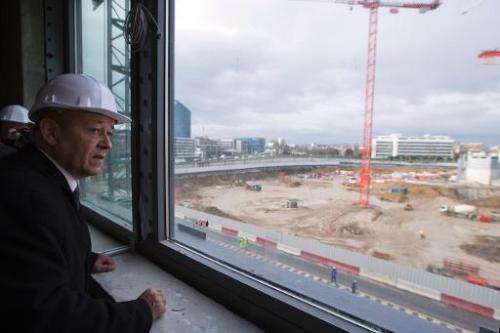 French Defence minister Jean-Yves Le Drian visits the construction site of the new French Defence minister on January 17, 2014 i