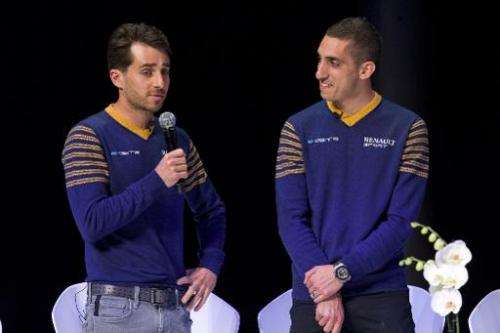 French driver Nicolas Prost (L) and Swiss driver Sebastien Buemi speak at the launch of the Formula E Championship in London on 