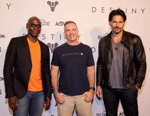 (From L) Lance Reddick, voice of Commander Zavala in 'Destiny', Pete Parsons, COO of Bungie, and actor Joe Manganiello attend th