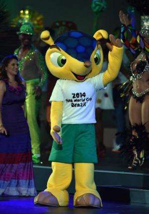 Fuleco the official mascot of the 2014 FIFA World Cup in Brazil dances on stage in Sao Paulo on June 10, 2014
