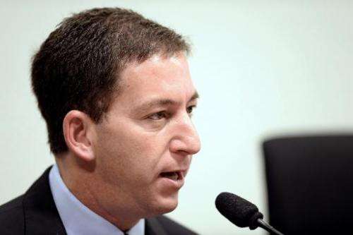 Glenn Greenwald testifies in Brasilia on October 9, 2013 before the investigative committee of the Senate that examines charges 
