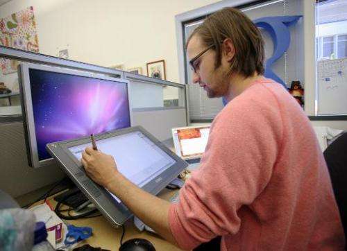 Google Doodle Creative Lead Ryan Germick works on an illustration at the Google headquarters in Mountain View, California, on Se
