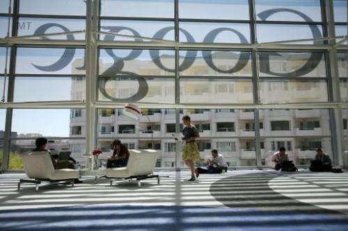 Google logo is seen through windows of Moscone Center in San Francisco on June 28, 2012