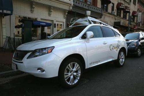 Google's Lexus RX 450H Self Driving Car is seen parked on Pennsylvania Ave. in Washington, DC, on April 23, 2014