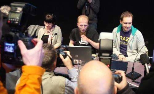 Gottfrid Svartholm Varg (C) and Peter Sundin, (R) from The Pirate Bay, an online piracy site meet the press in Stockholm, Sweden