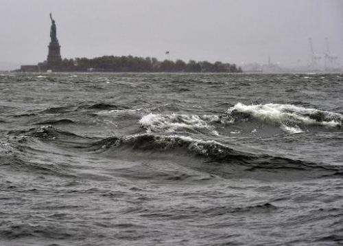 High surf on the Hudson River is seen near the Statue of Liberty on October 29, 2012, as New Yorkers brace for Hurricane Sandy