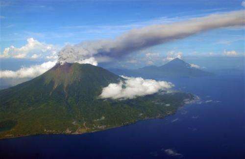 Indonesia volcano erupts, injuring 4; 1 missing