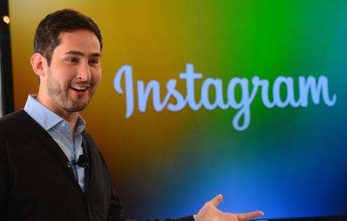 Instagram co-founder Kevin Systrom addresses a press conference in New York on December 12, 2013