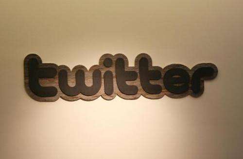 In this March 11, 2011 file photo, the Twitter logo is displayed at the entrance of Twitter headquarters in San Francisco, Calif