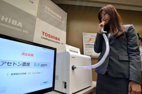 Japan's electronics giant Toshiba unveils the prototype model of a breathalyser which can detect a wide range of diseases just 3
