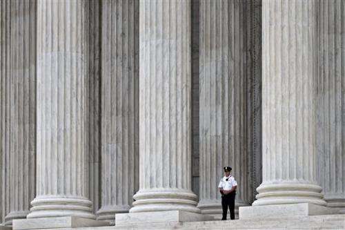 Justices weigh limits of free speech over Internet